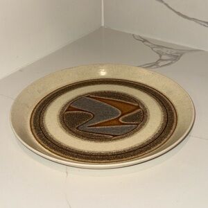 Vintage Ceramic Plate with Earthy Tones